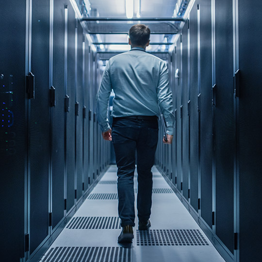 Man walking in server room